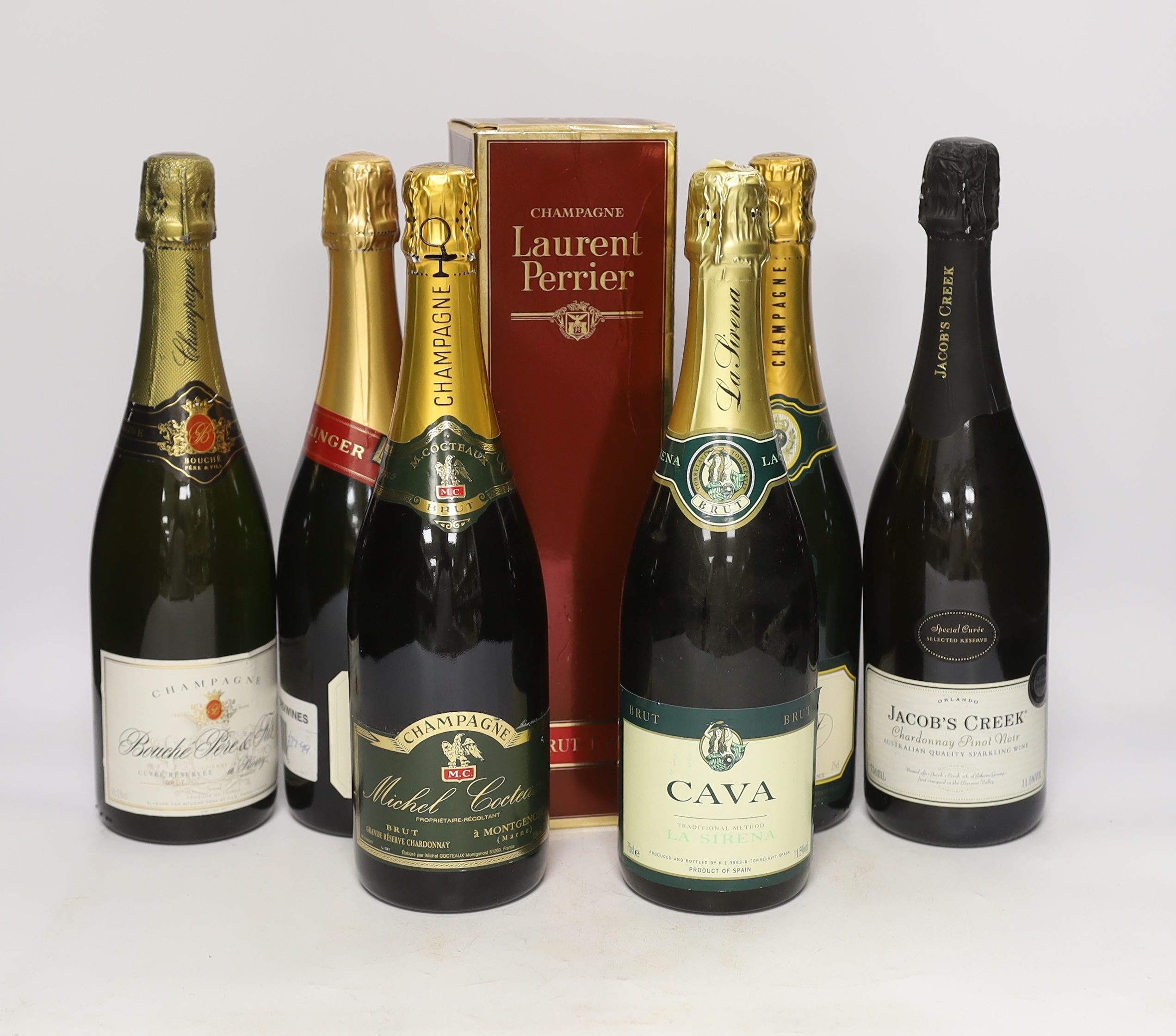 Seven various bottles of champagne, cava and sparkling wine including Laurent Perrier, Bollinger, Bouché Père & Fils etc.